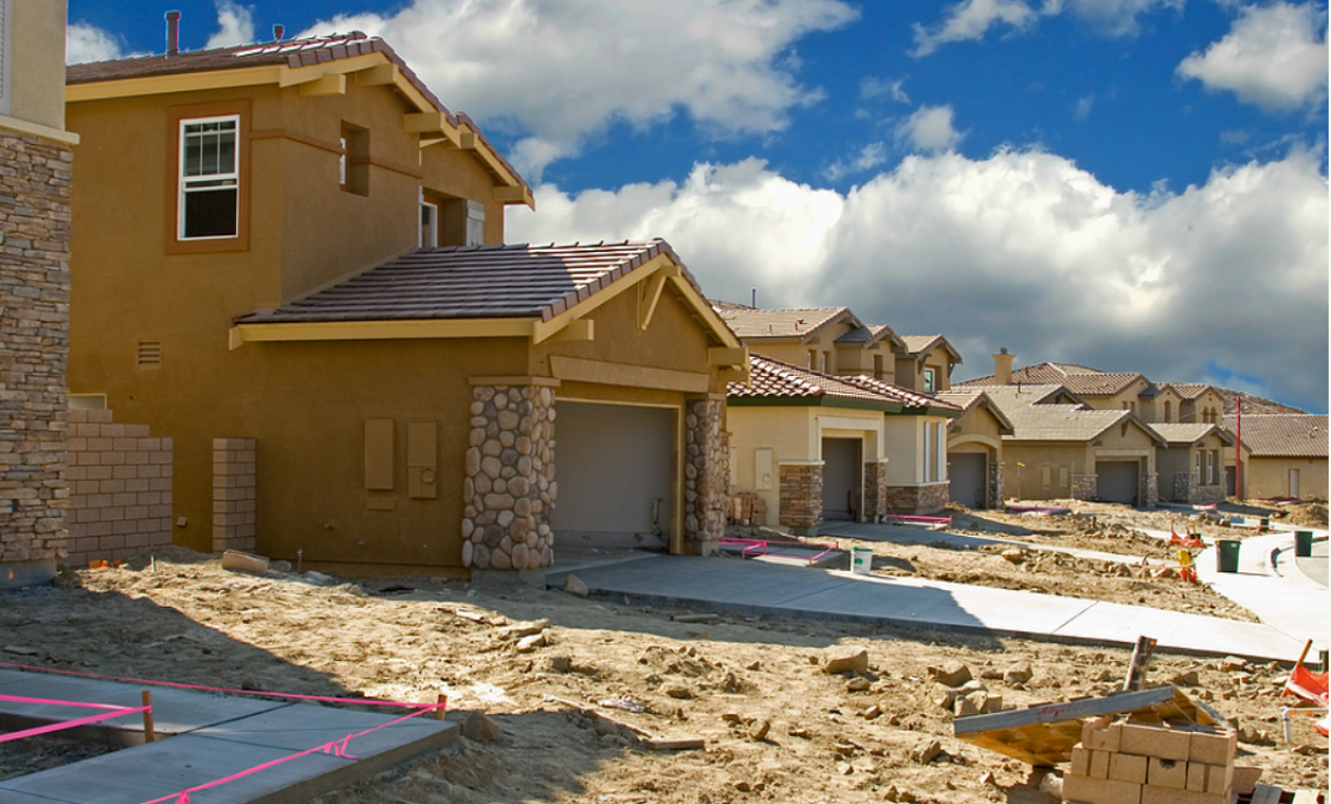 The Cost Benefits of Choosing Stucco Over Other Materials, New residential construction in a subdivision of a new community