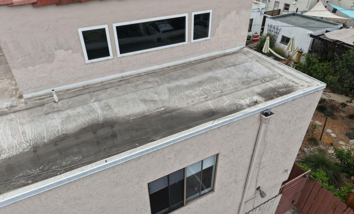 Water damage visible on a stucco exterior in San Diego